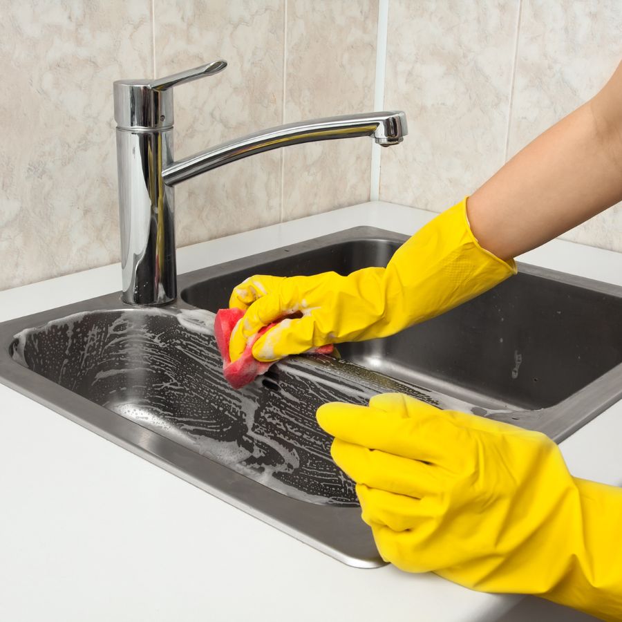 rubber gloves cleaning sink