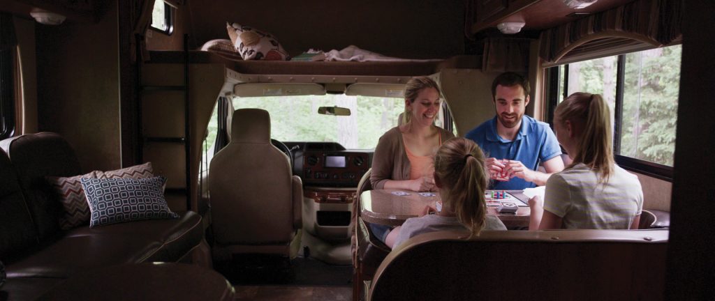 Family playing Game inside a Motorhome 