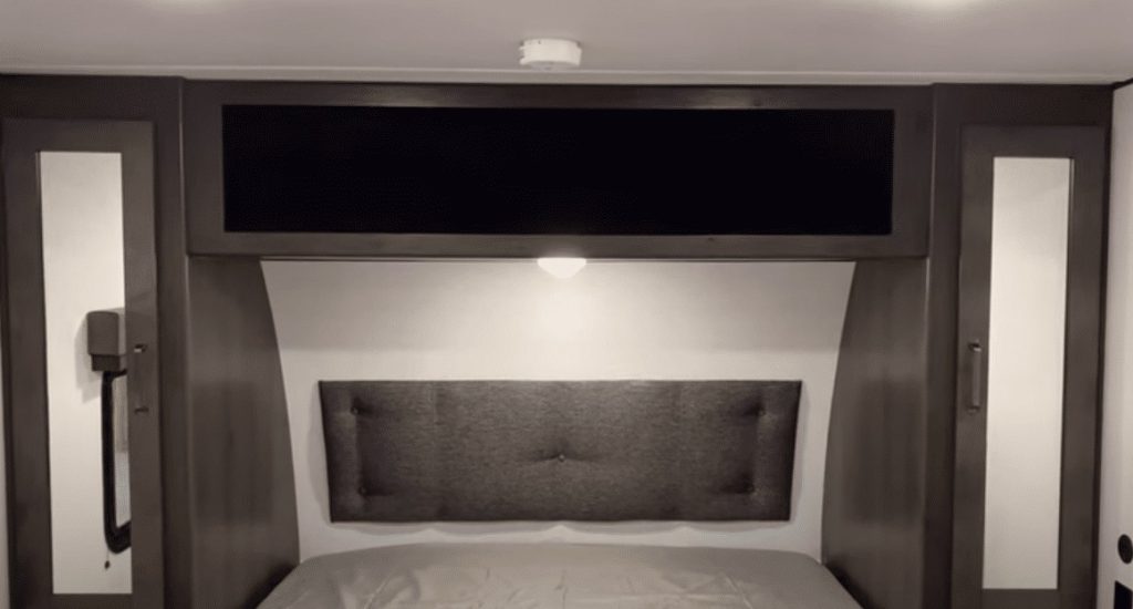 The Grand Design Transcend 245RL above bed cabinets