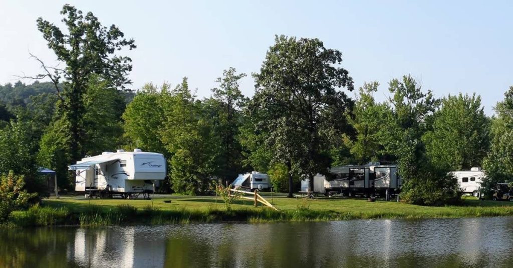 RVs in a Campground by a lake