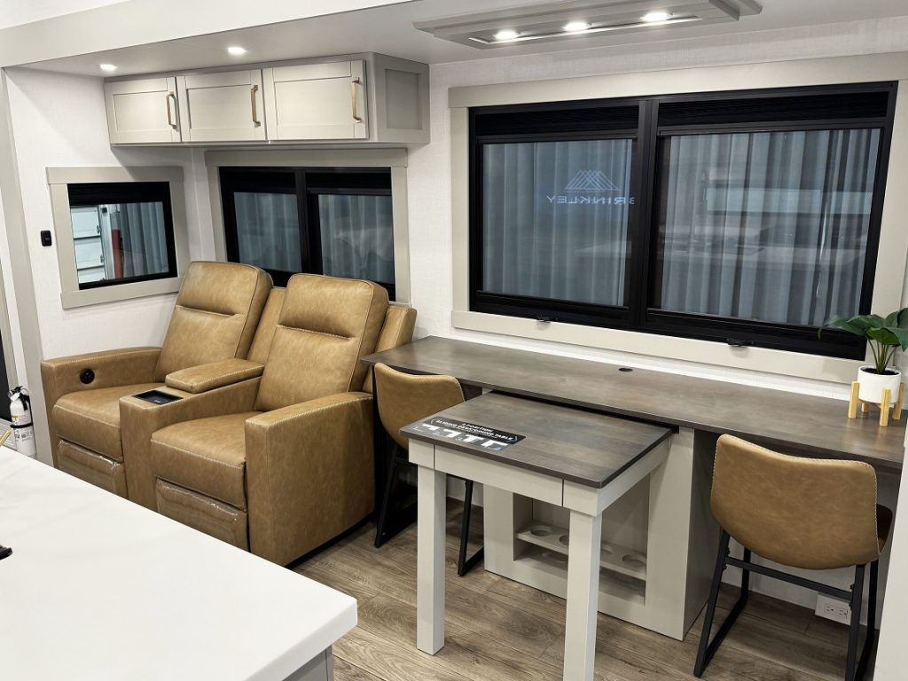 theater seating and adjustable desk/table inside Brinkley Z 3420