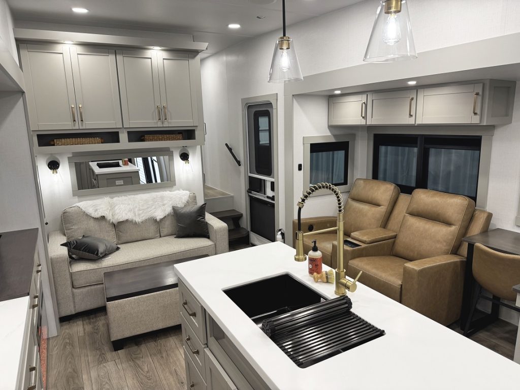 Kitchen Island with lots of counterspace-- with living area in background-- inside Brinkley Z 3420