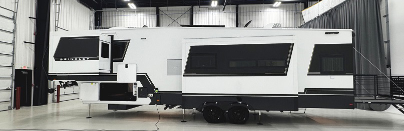 The luxury Brinkley Z 3420 -- exterior side view with patio deck extended