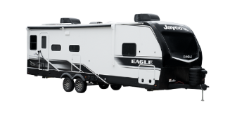 A white and black Jayco Eagle travel trailer with dual axles and a modern aerodynamic front cap. The trailer features multiple windows, two rooftop air conditioning units, exterior storage compartments, and a fold-down entry staircase. Designed for towing, it offers a sleek and contemporary RV design.