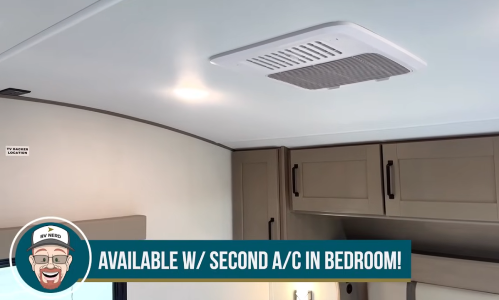 2026 Grand Design Reflection 150 270BN bedroom ceiling with optional second air conditioner unit, overhead lighting, and storage cabinetry for enhanced comfort and climate control.