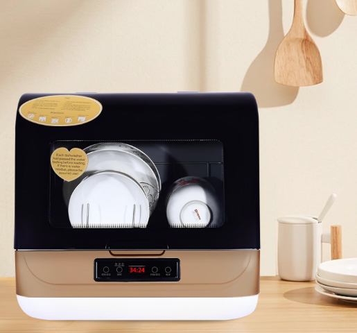Compact countertop dishwasher on a kitchen counter with dishes loaded inside, designed for small spaces such as RVs, apartments, and tiny homes.