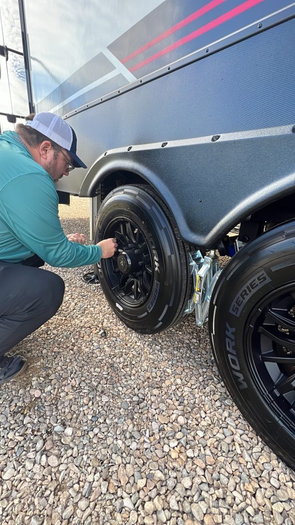 RV owner checking tires