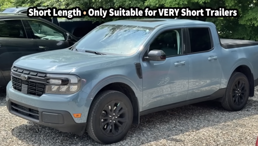 Light-duty midsize pickup truck shown in a parking lot, highlighting short wheelbase length and limited suitability for towing very short travel trailers.