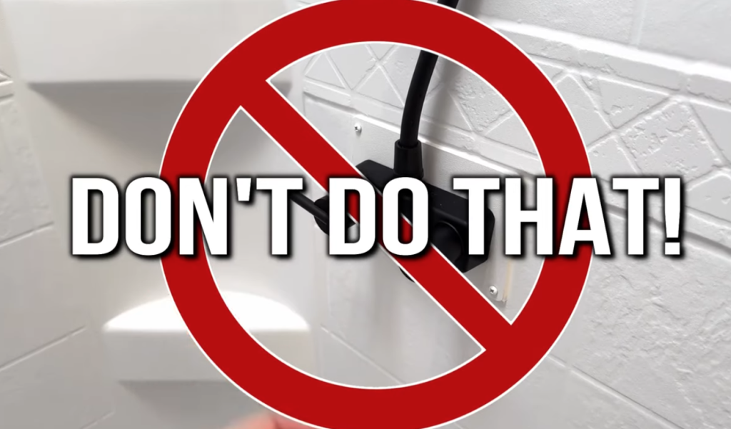Warning graphic showing a red “do not” symbol over an RV shower faucet with text reading “Don’t do that”