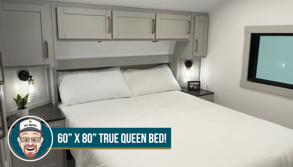 RV bedroom with 60 x 80 true queen bed and overhead storage cabinets