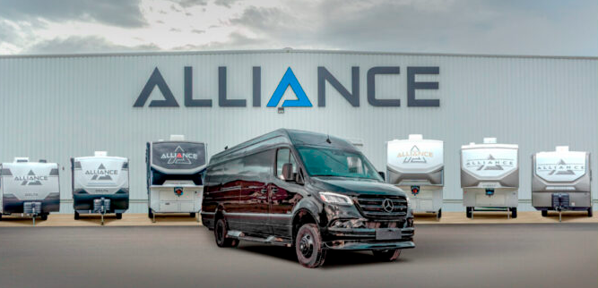 Alliance RV dealership building with luxury motorhome parked in front