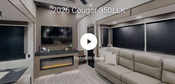 Interior of 2026 Cougar 350LLK fifth wheel featuring sofa seating, entertainment center with TV and fireplace, and 3D tour preview overlay.