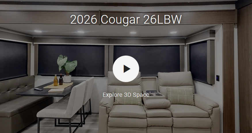 Travel trailer living area with theater seating, dinette booth, and large rear windows, labeled “2026 Cougar 26LBW,” shown with a 3D tour overlay.
