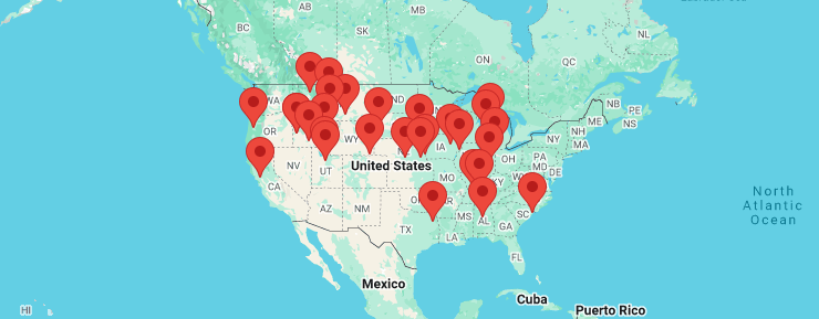 Map of the United States with multiple red location pins spread across various regions, indicating numerous RV dealership or service locations nationwide.