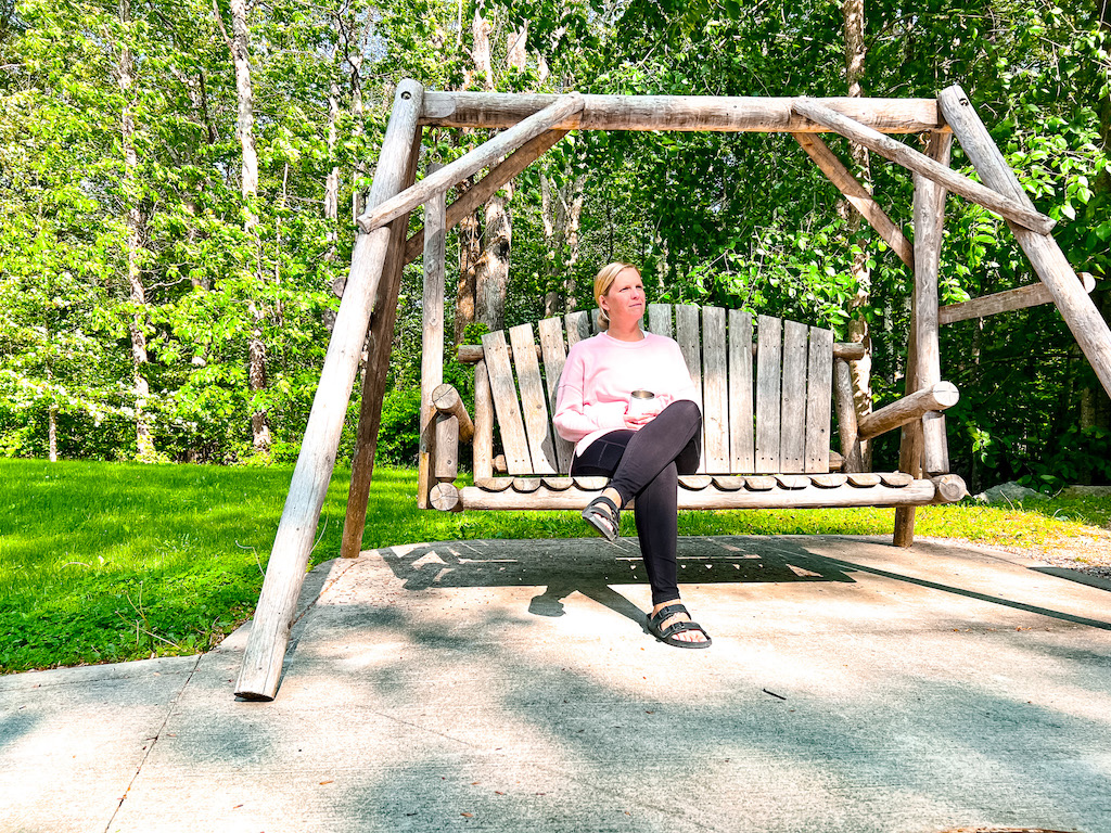Camper Drinking Coffee Campsite