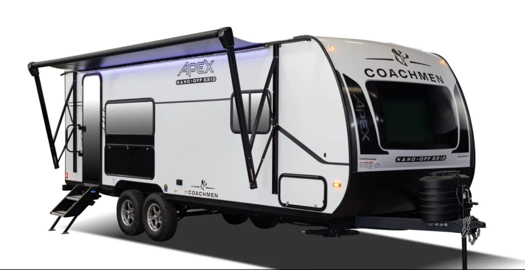 Coachmen Apex Nano Off-Grid travel trailer with white exterior, dual axles, extended awning, and LED accent lighting shown on a white background.