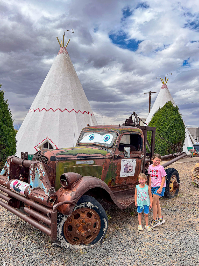 Kids posing with Tow Mater on Route 66