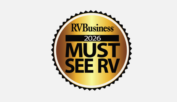 RVBusiness 2026 Must See RV award badge featuring a gold medallion design with bold black lettering. The industry recognition highlights standout RV models selected as must-see products for innovation, design, features, and consumer appeal in the 2026 model year
